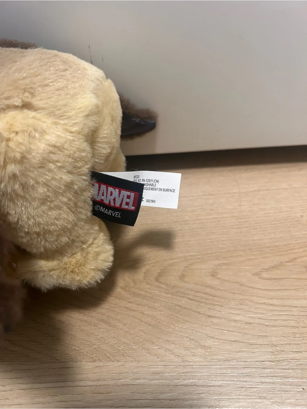 Marvel Tan and Brown Plush Morris Toy with Colorful Wing Detail